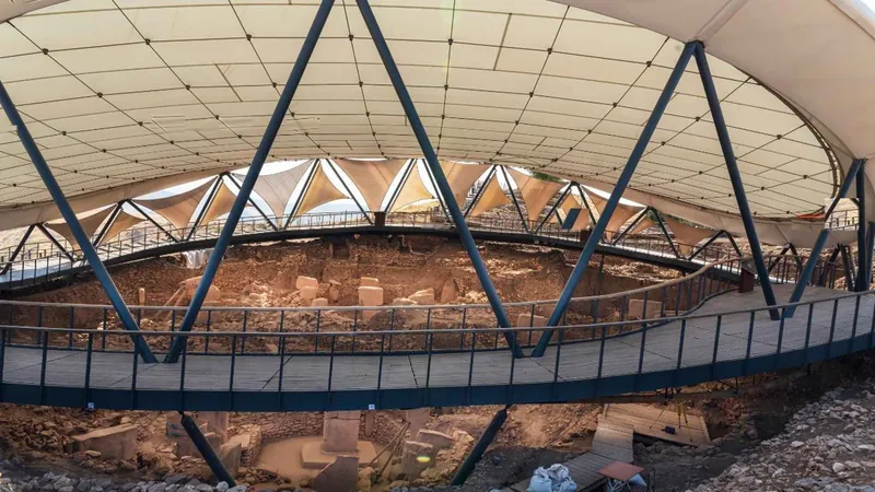 The steel walkway under the white protective roof over the dig on a Gobekli Tepe tour from Istanbul, Turkey