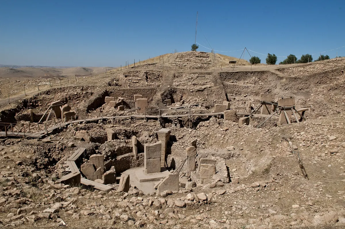 The excavated enclosures and standing pillars on the hilltop at Göbekli Tepe, the goal of Gobekli Tepe tours from Istanbul by plane